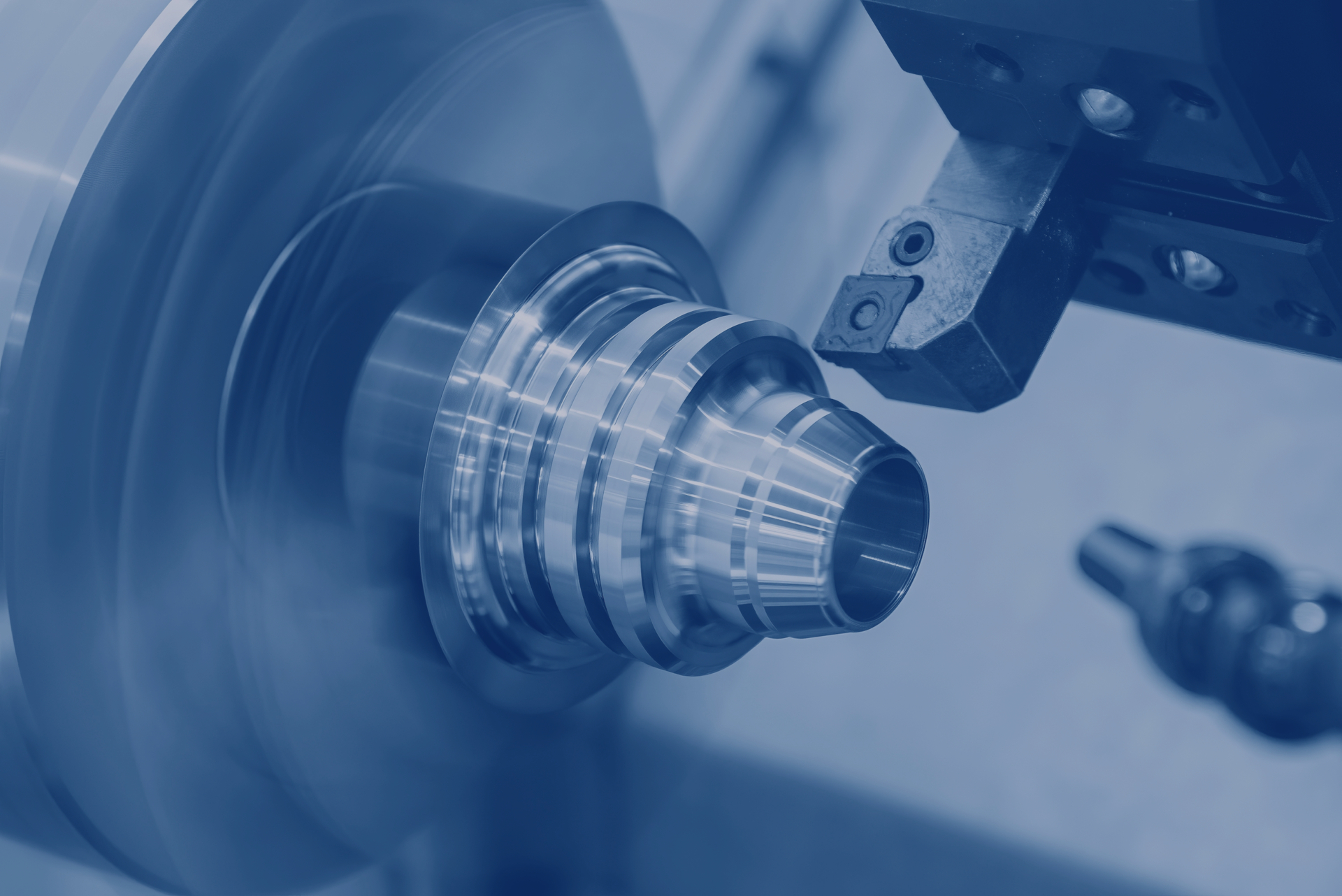 The,Cnc,Lathe,Machine,Forming,Cutting,The,Metal,Shaft,Parts.